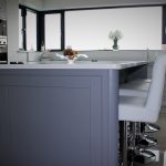 Peninsula Kitchens - Dark base White counter
